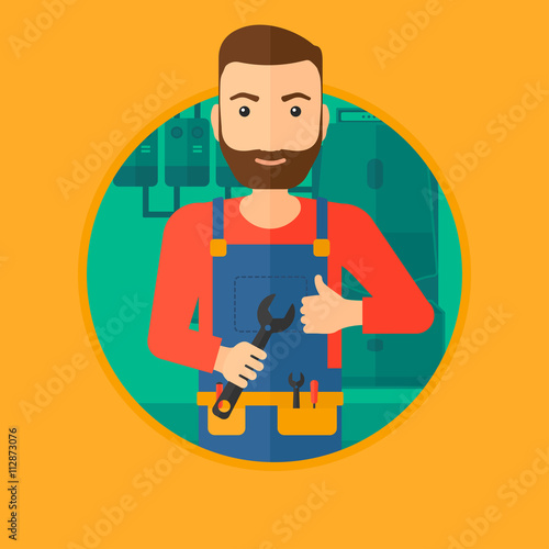 Cheerful repairman with spanner.