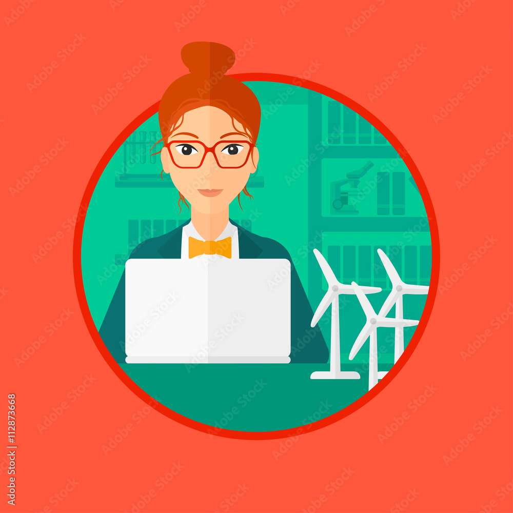 Woman working with model wind turbines on table. Woman working with model wind turbines on table.