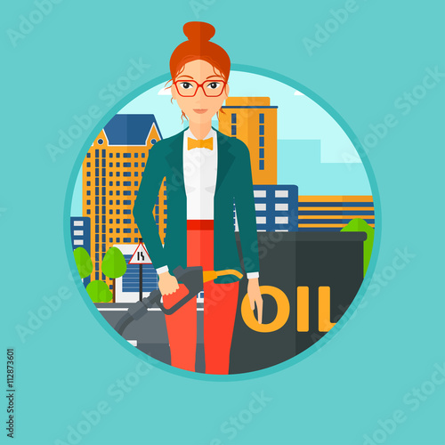 Woman with oil barrel and gas pump nozzle.