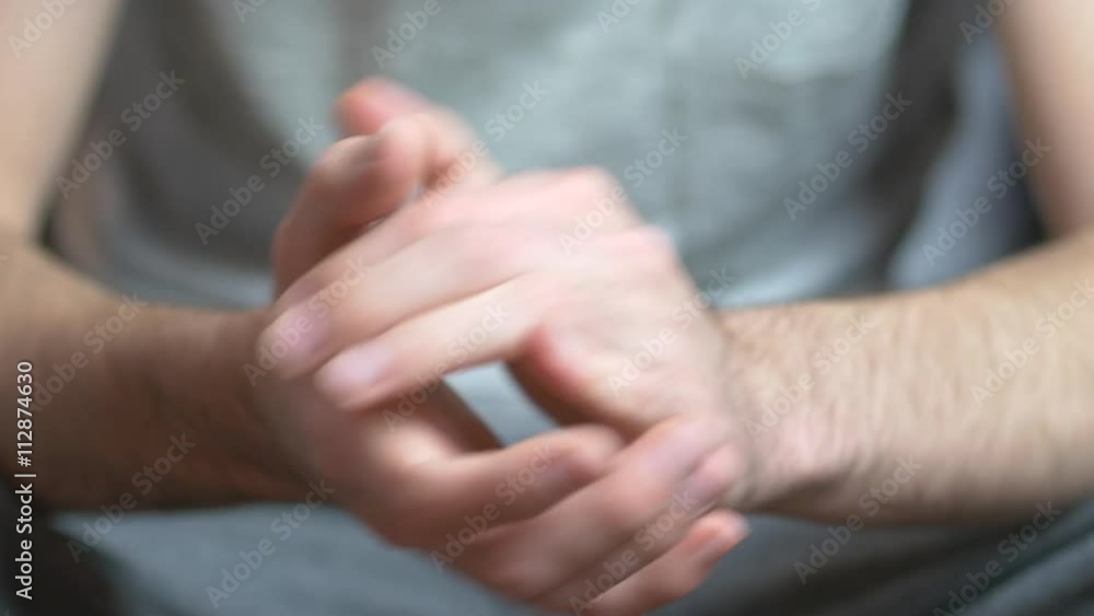 Caucasian young man clapping with his hands. Caucasian young man clapping with his hands.