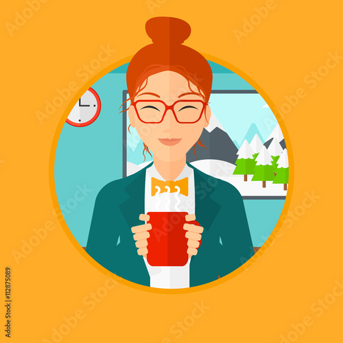 Woman enjoying cup of hot coffee.
