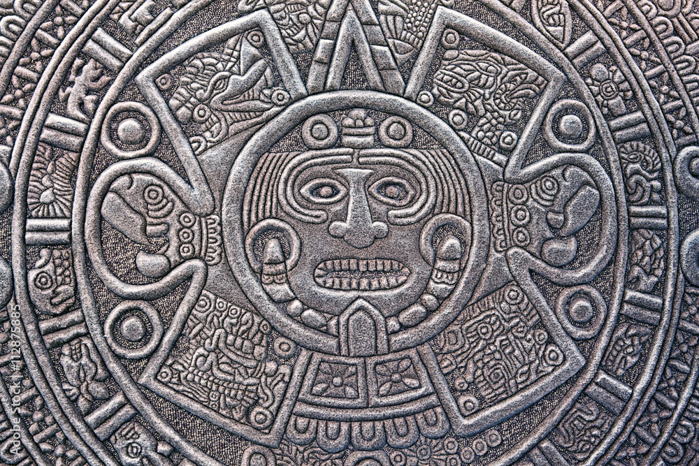 Pagan ornament of a tribe Maya. stone texture