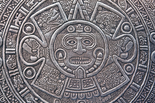 Pagan ornament of a tribe Maya. stone texture