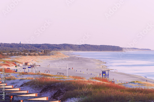 Fototapeta Naklejka Na Ścianę i Meble -  Sundown on beach in Baltic Sea in Ventspils in Latvia