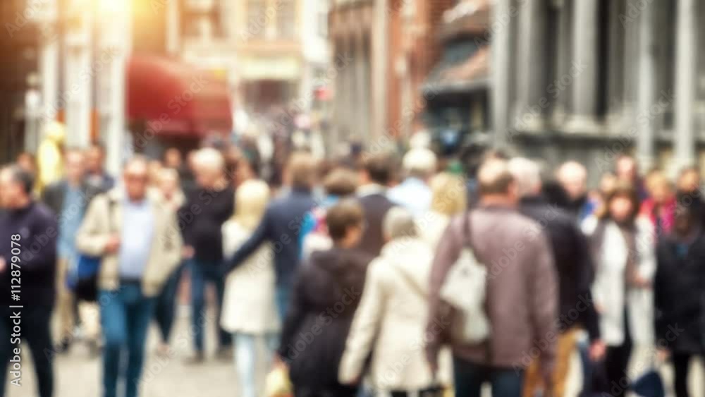 Blurred background with anonymous crowd walking European city street. 4K Blurred background with anonymous crowd walking European city street. 4K