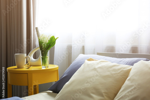 Unmade bed with crumpled bl...