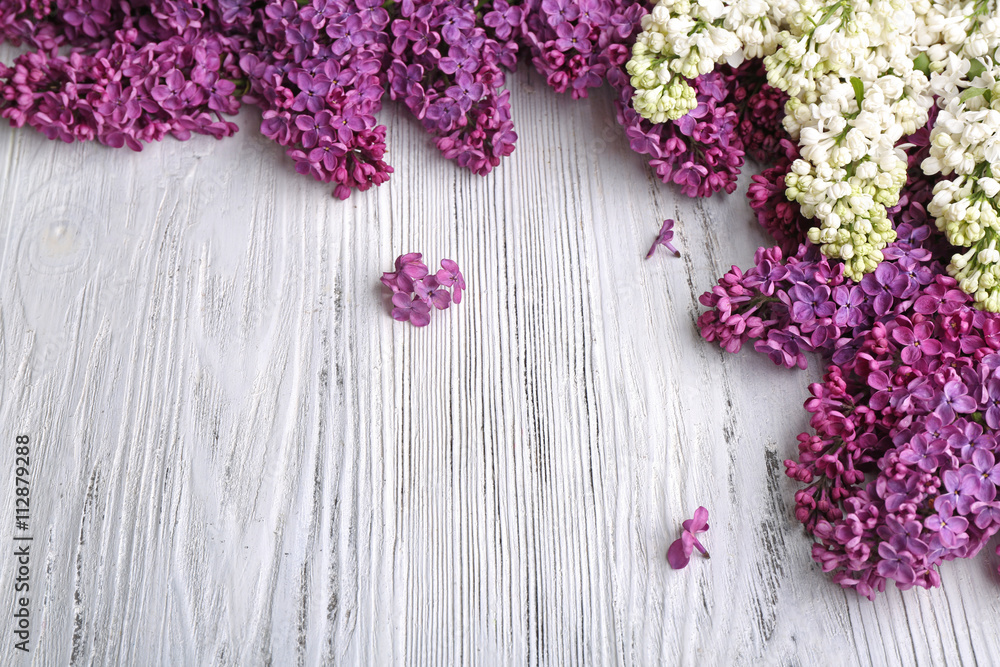 Fresh lilac on wooden background Fresh lilac on wooden background
