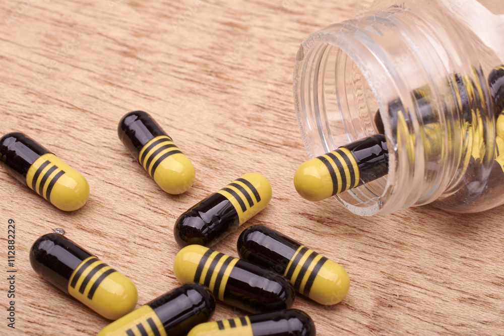 Capsules or pills of medicament from transparent bottle Capsules or pills of medicament from transparent bottle