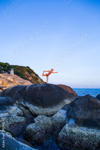 Yoga position on the beach