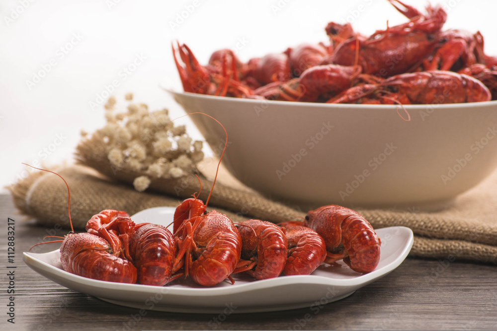 boiled big crawfish on the wooden surface boiled big crawfish on the wooden surface