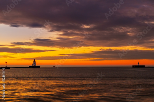 Lake Erie beacons at the mouth of Cleveland's harbor at sunset
