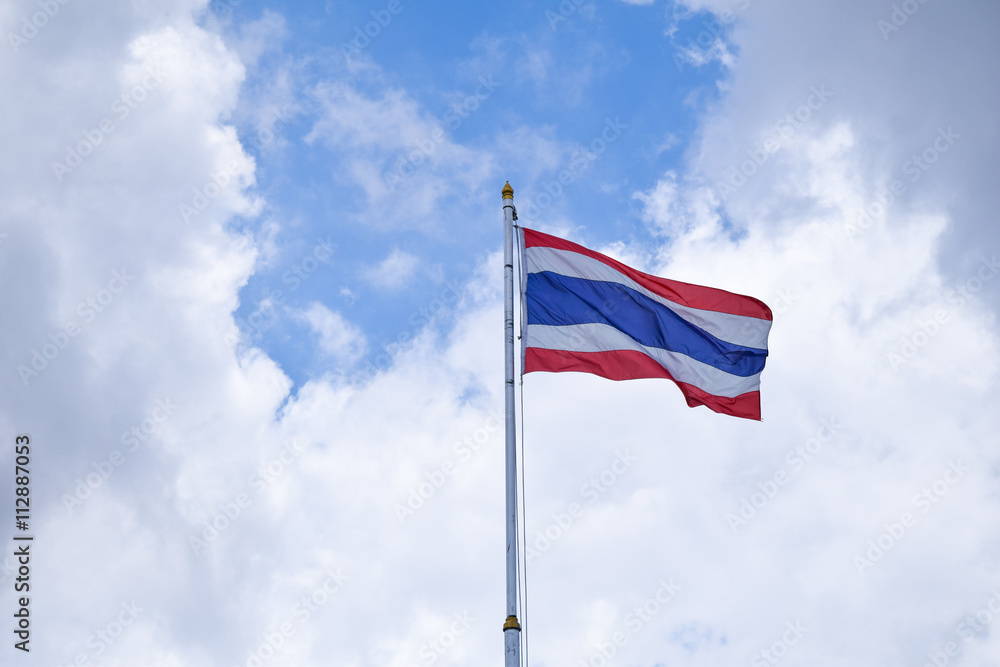 Thai flag of Thailand with blue sky background