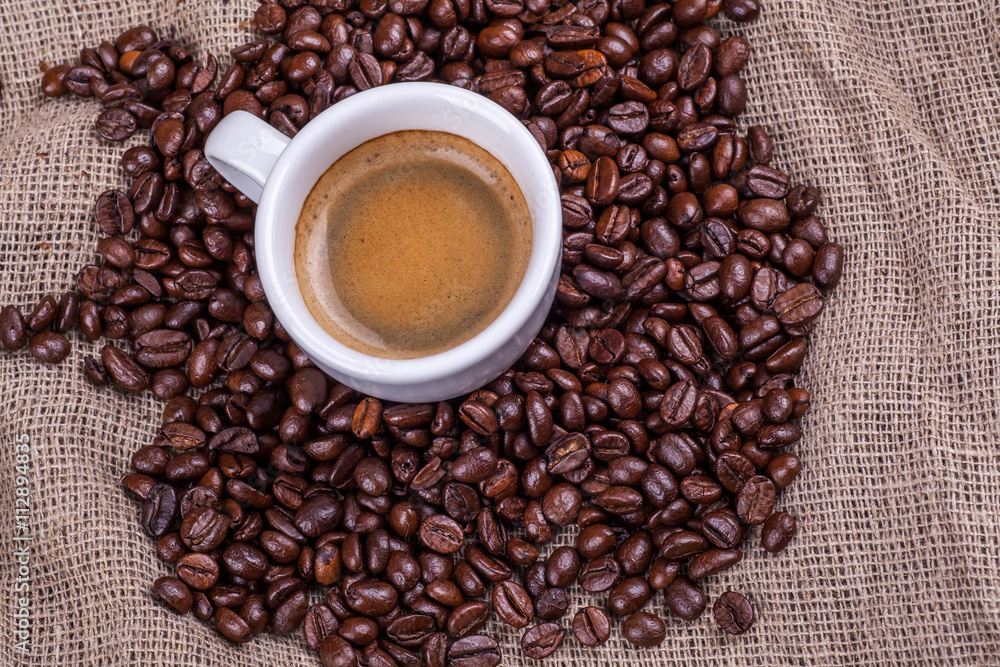 Fototapeta premium Cup of coffee and beans