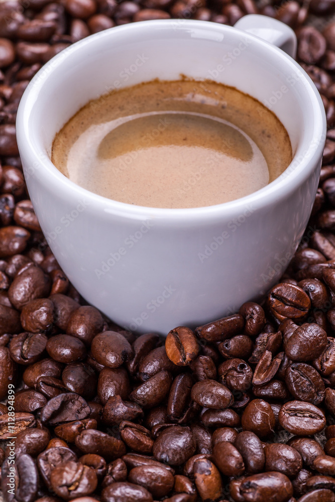 Cup of coffee and beans Cup of coffee and beans