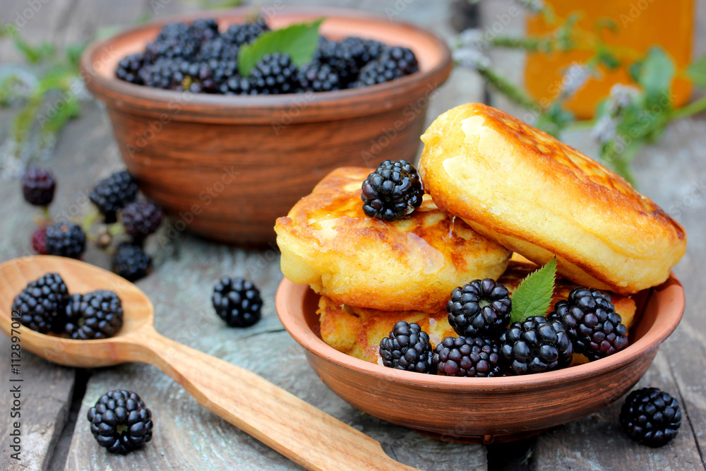 Delicious pancakes with berries and honey Delicious pancakes with berries and honey