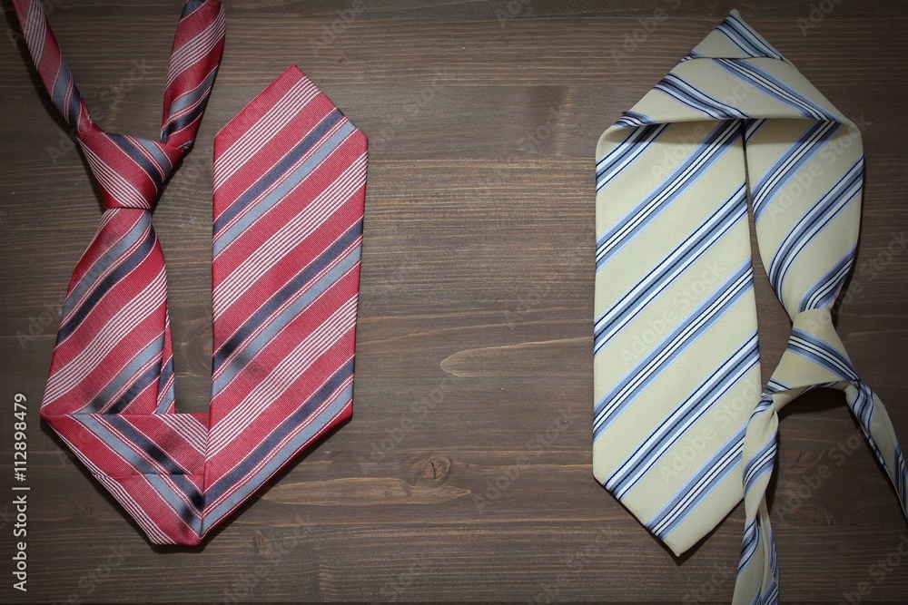 Obraz premium Happy father day, three ties on the wooden background