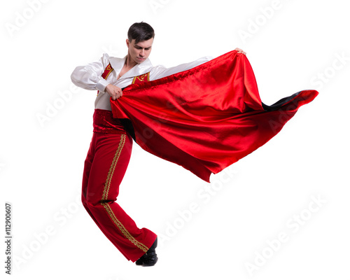 Dancing man wearing a toreador costume. Isolated on white in full length. photo