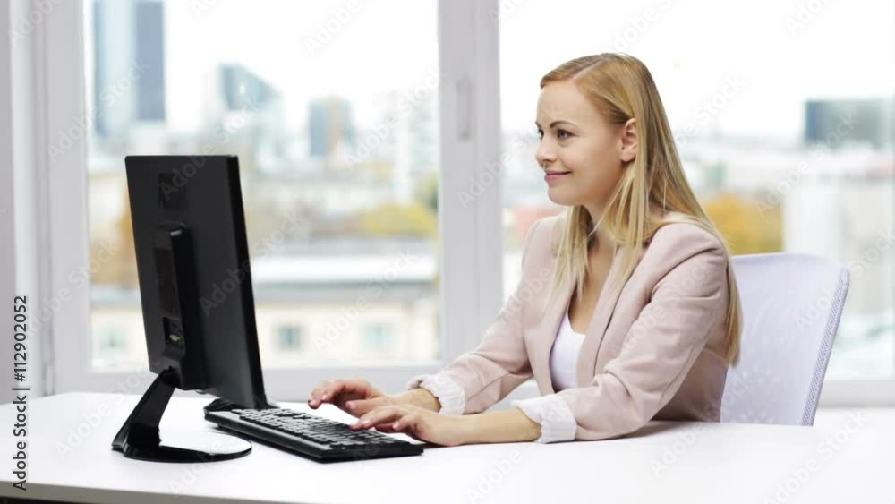 businesswoman with computer typing at office businesswoman with computer typing at office