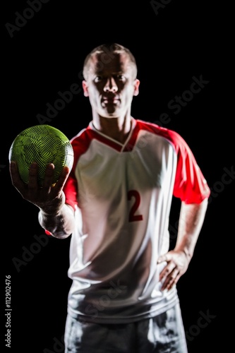 Sportsman holding a ball © WavebreakMediaMicro
