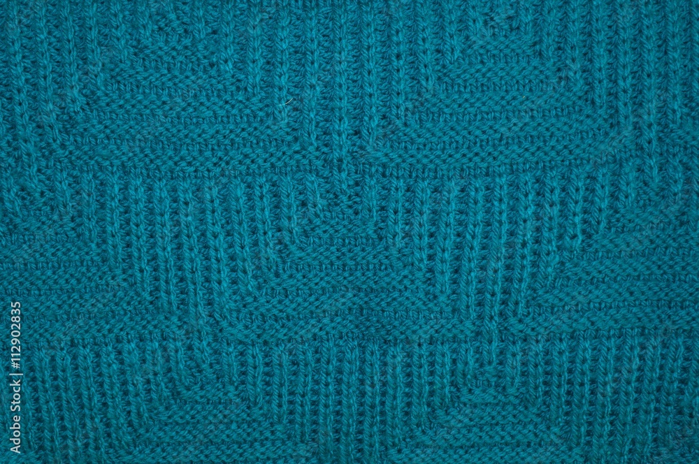 Background texture of knitted blue pullover Background texture of knitted blue pullover