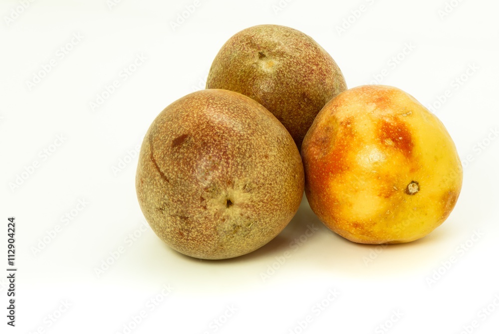 Closeup of passion fruits isolated on white Closeup of passion fruits isolated on white