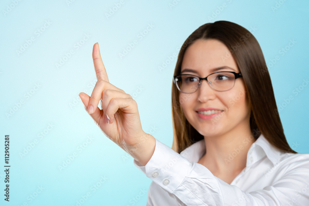 portrait of businesswoman pointing at floating screen portrait of businesswoman pointing at floating screen