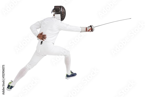 Man wearing fencing suit practicing with sword © WavebreakmediaMicro