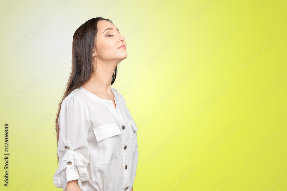 Closeup portrait of a young woman praying Closeup portrait of a young woman praying