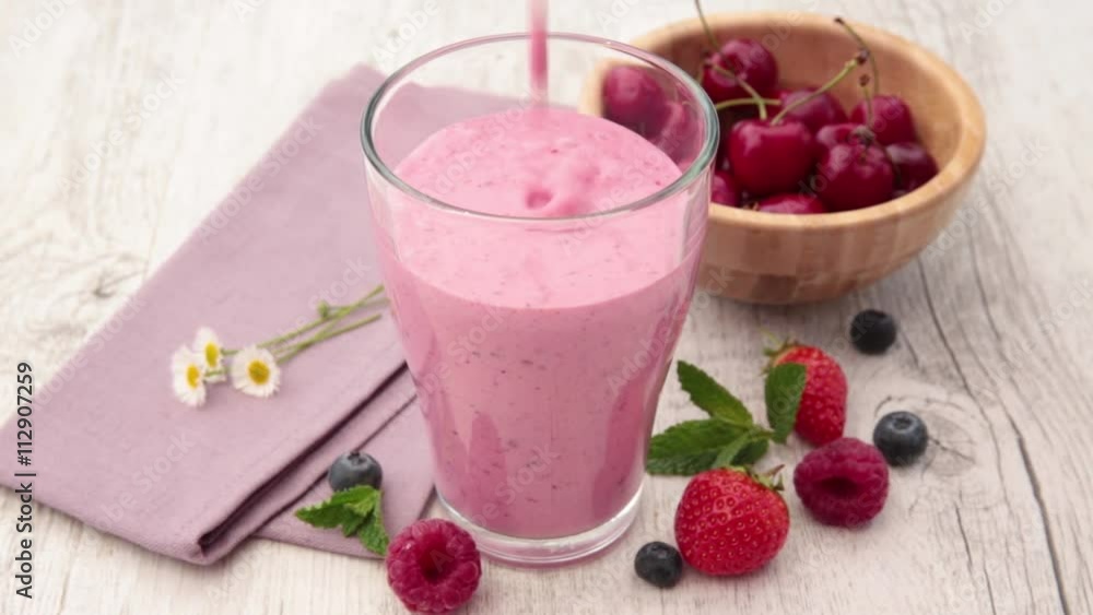 berry smoothie pour in glass berry smoothie pour in glass