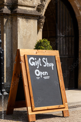 NEWSTEAD ABBEY, JUNE 5:  A chalk board A-sign stating Gift Shop Open. At Newstead Abbey, Nottinghamshire, England. On 5th June 2016. photo