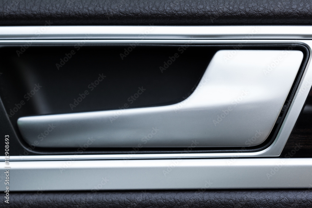 Inner door handle, modern car interior detail