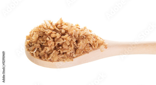 Fast Food cereals in a wooden spoon isolated on white.