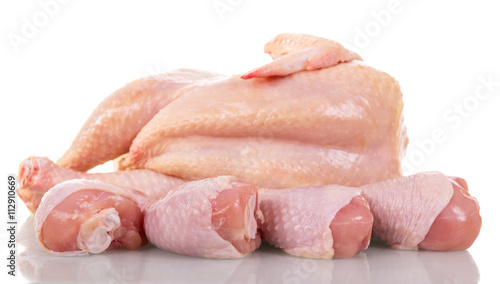 Raw chicken legs isolated on white.
