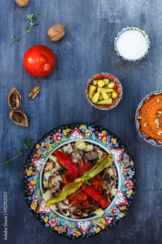 Iskender kebab - turkish food in traditional dishes, top view