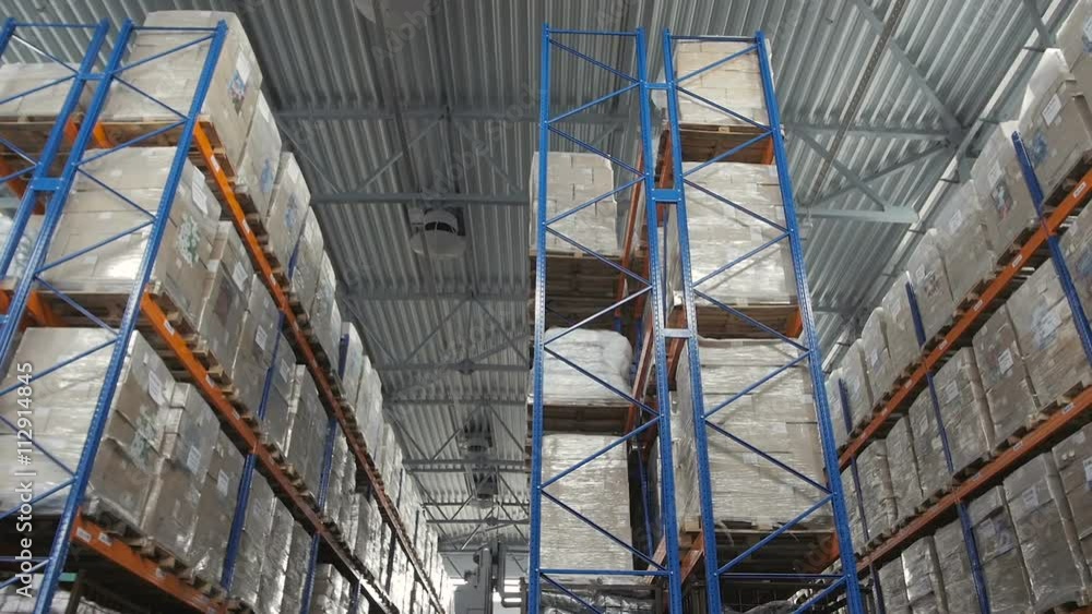 Forklift Truck Driver Loading Pallet In Storage Warehouse Forklift Truck Driver Loading Pallet In Storage Warehouse