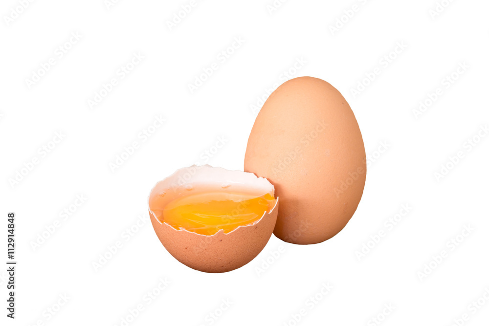 Fresh farm eggs. A egg yolk in cracked egg shell. Fresh farm eggs. A egg yolk in cracked egg shell.