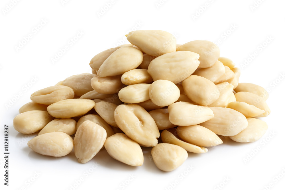 Pile of peeled whole almonds isolated on white. Pile of peeled whole almonds isolated on white.