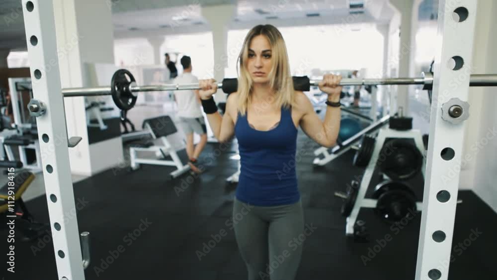 sexy girl with sexy body doing barbell workout routine in gym, healthy lifestyle sexy girl with sexy body doing barbell workout routine in gym, healthy lifestyle