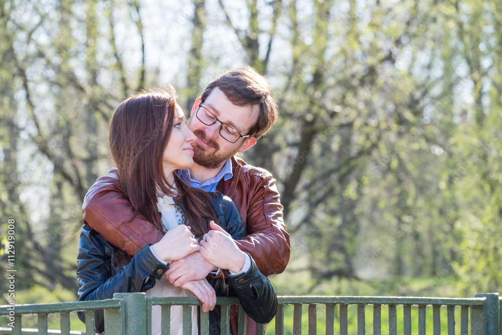 Young couple on bridge Young couple on bridge
