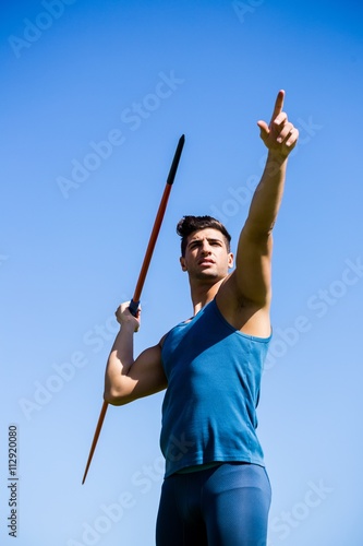 Athlete about to throw a javelin photo