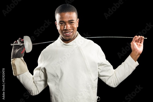 Schilderij op canvas Portrait of swordsman standing with sword