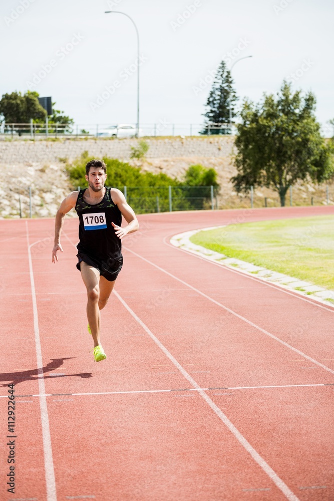 Athlete running on the racing track