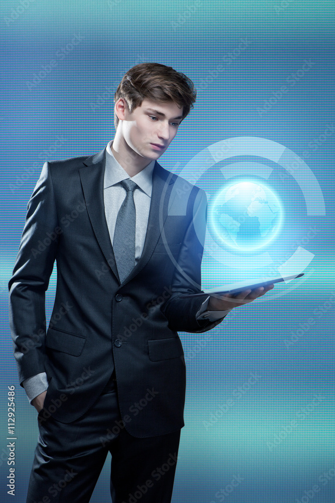 Young businessman with touch screen computer Young businessman with touch screen computer