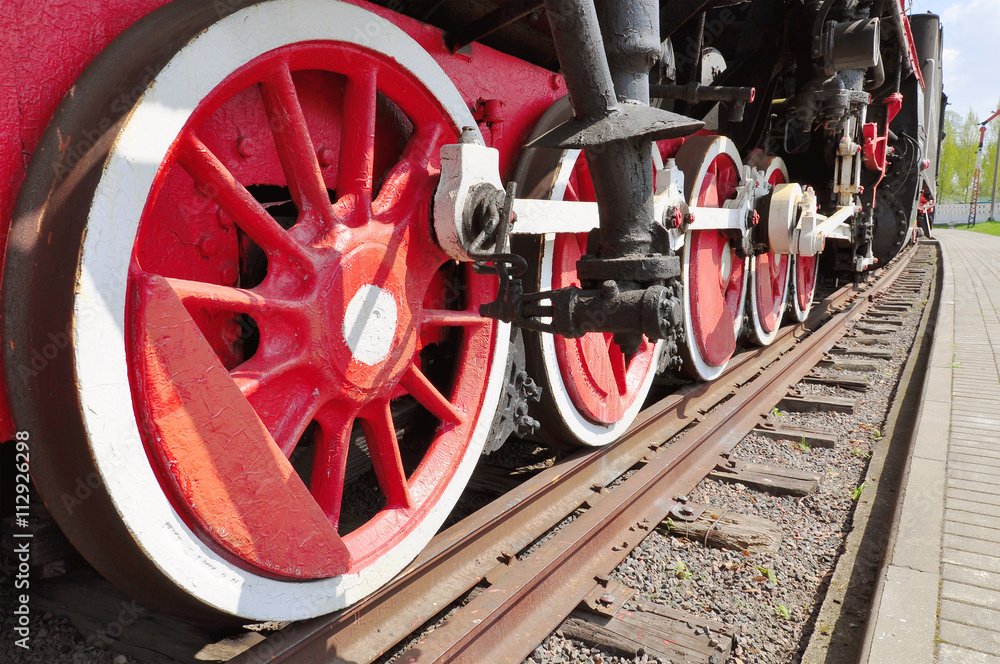 The old iron railway locomotive red wheels. The old iron railway locomotive red wheels.