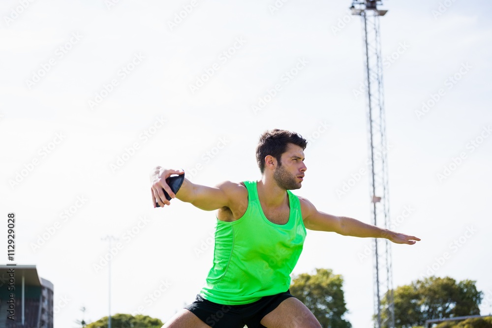 Athlete about to throw a discus Athlete about to throw a discus