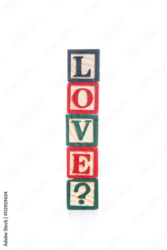 photo of a alphabet blocks spelling LOVE? isolate on white backg photo of a alphabet blocks spelling LOVE? isolate on white backg