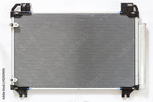 Car condenser radiator on white background. Radiator top view of