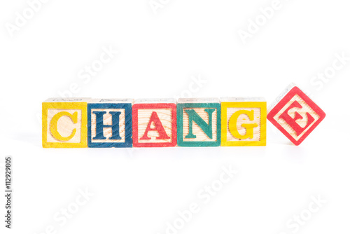 Fotografi photo of a alphabet blocks spelling CHANGE isolate on white back