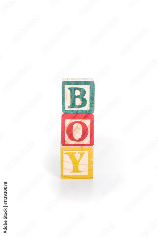 photo of a alphabet blocks spelling BOY isolate on white backgro photo of a alphabet blocks spelling BOY isolate on white backgro
