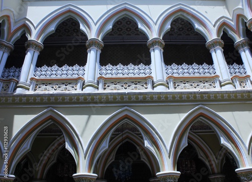 The yellow arches of the Bangalore Palace in Bangalore, India  photo